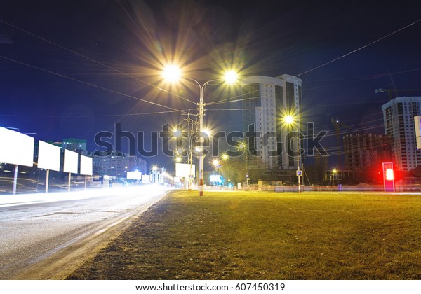 night road, fires of cars\
and lamps