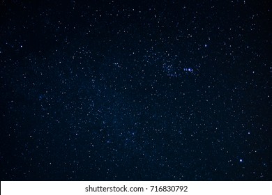 Night scape with beautiful stary sky at the high mountain. Star texture. Space background.  - Shutterstock ID 716830792