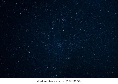 Night scape with beautiful stary sky at the high mountain. Star texture. Space background.  - Shutterstock ID 716830795