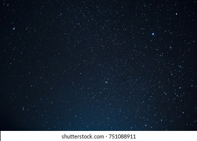 Night scape with beautiful stary sky at the high mountain. Star texture. Space background.  - Shutterstock ID 751088911