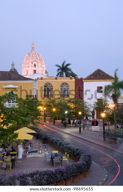 night scene car light streaks  of square\
restaurant Naval Museum Iglesia Church of Santo Domingo Cartagena\
de Indias Colombia South\
America