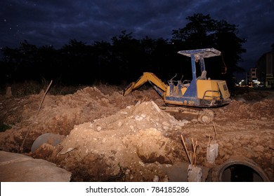 Night scene of Crawler Dozer in the construction site