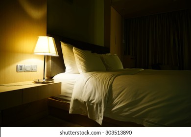 Night Scene In Hotel Room, Nightstand With Lamp