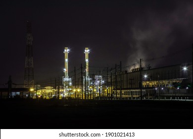 Night Scene Of Industry Factory Plant With Modern Warehouse, Environmentally Friendly Manufacturing Plant Of New Technology Production Line