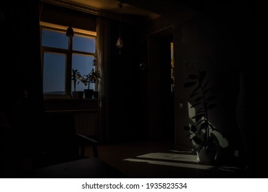 Night Scene Of Moon Seen Through The Window From Dark Room. Moonlight Inside Dark Room