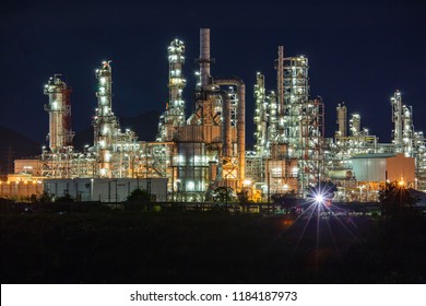 Night Scene Of Oil Refinery Plant Of Petrochemistry Industry In Twilight Time