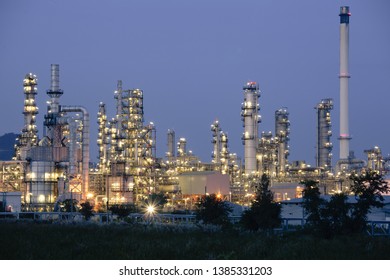 Night Scene Of Oil Refinery Plant Of Petrochemistry Industry In Twilight Time