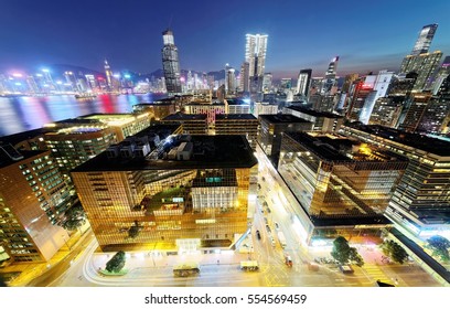 Night Scenery Of Hong Kong, Viewed From Tsim Sha Tsui Area In Kowloon, With City Skyline Of Crowded Skyscrapers Along Victoria Harbour In Blue Twilight ~ Beautiful Cityscape Of Hongkong At Dsuk