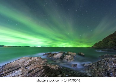 Night Sea On Green Sky Background