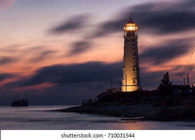 Night shifts (Lighthouse at Cape Tarkhnkut, Crimea after dark)