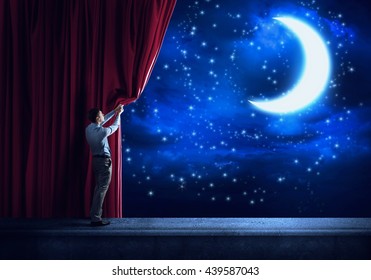 Night sky behind curtain