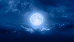 Night Sky With Full Bright Moon In The Clouds "Elements Of This Image Furnished By NASA"