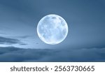 Night sky with full moon in the clouds "Elements of this image furnished by NASA"