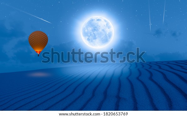 Night sky with\
full moon in the clouds on the foreground sand dune \