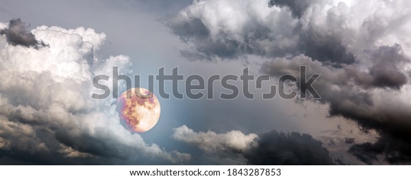 Night sky with full moon and clouds .Nature\
abstract background.