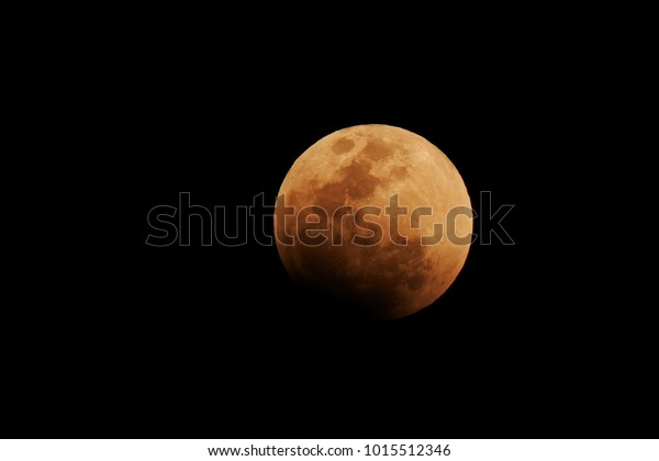 Night sky and a full moon.\
Super Blue Blood Moon 2018: Super Blue Blood Moon due to a Lunar\
Eclipse.