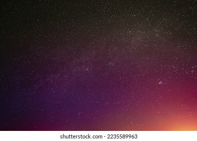 Night Sky Glowing Stars Background Backdrop. Colorful Sky Gradient. Sunset Sunrise Dawn Lights And Colourful Night Starry Sky In Yellow Pink Magenta Orange Purple Colors.