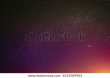 Night Sky Glowing Stars Background Backdrop. Colorful Sky Gradient. Sunset Sunrise Dawn Lights And Colourful Night Starry Sky In Yellow Pink Magenta Orange Purple Colors.