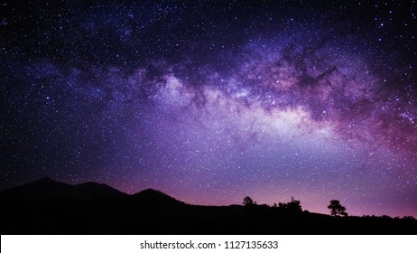 Night sky photo of the Milky Way Galaxy's core over El Teide mountain on Spain's Tenerife island.