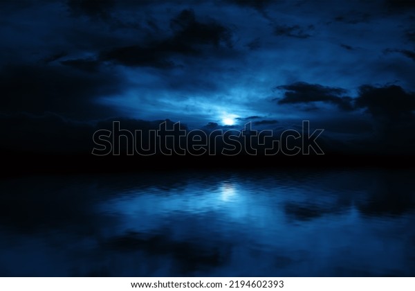 Night sky and sea reflection. Ocean water at\
night landscape