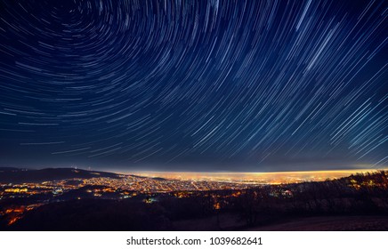 
Night Sky Star Trail Over The City