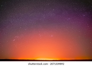 Night Sky Stars Background Backdrop. Colorful Sky Gradient. Sunset, Sunrise Lights And Colourful Night Starry Sky In Yellow Pink Magenta Orange Purple Colors. Copy Space.