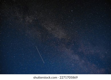 Night sky stars and meteor trace - Shutterstock ID 2271705869