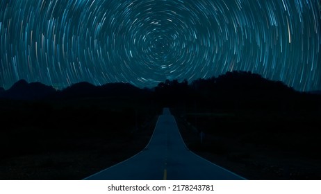 Night Sky With Stars Tails And Rotating Stars Straight Road At Night