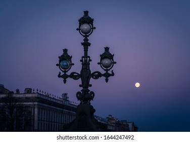 Night In St. Petersburg, Russia. The Moon In The Sky.