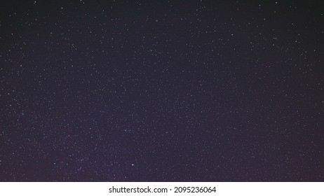 Night Starry Sky With Glowing Stars. Bright Glow Of Sky Stars. Copy Space. Natural Night Background Backdrop 4K.