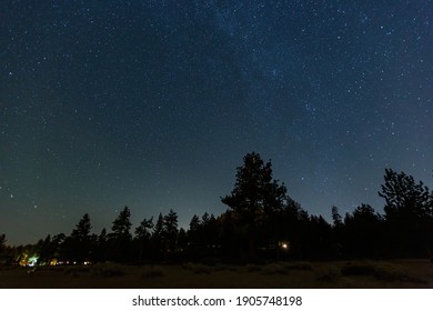 Night Starry Sky Over The Lake Tahoe Area At Nevada, USA