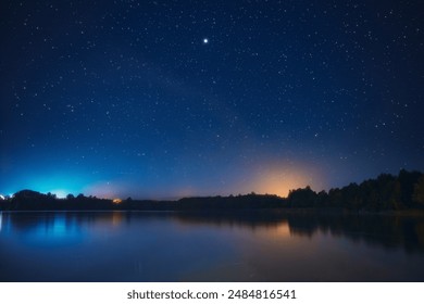 Night Stars Above Lake. Natural Starry Sky Background Backdrop Landscape. - Powered by Shutterstock