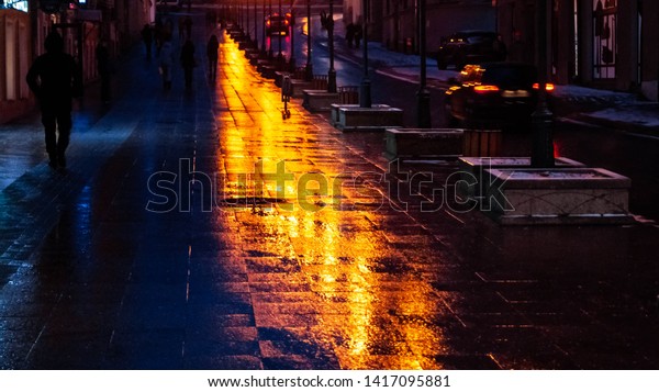 Night street after rain in\
winter
