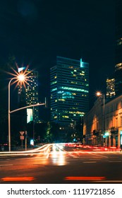 night street in the background of modern buildings