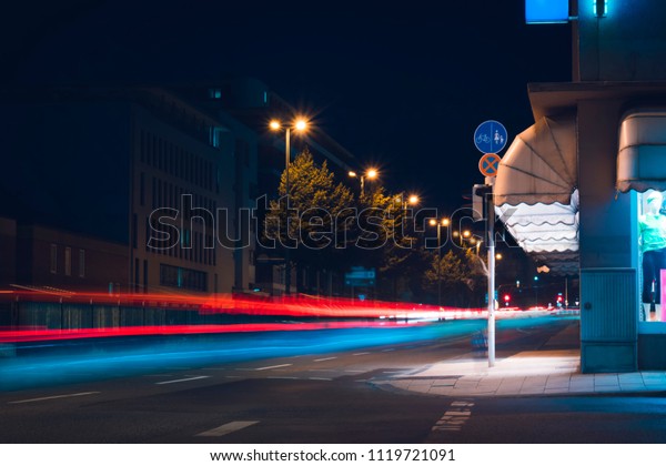 night street\
in the background of modern\
buildings