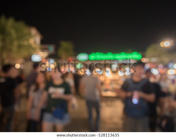 Night street\
 Jatujak Bangkok Thailand market\
blur