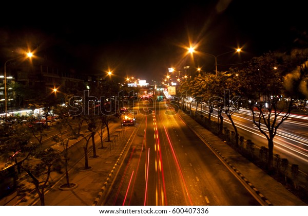Night street\
road with speed line in Bangkok.\
