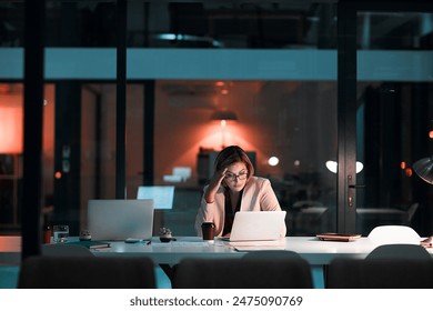 Night, stress or business woman thinking on laptop in office with headache, glitch or frustrated by 404. Working late, vertigo or manager with brain fog, fatigue or overwhelmed by project deadline - Powered by Shutterstock