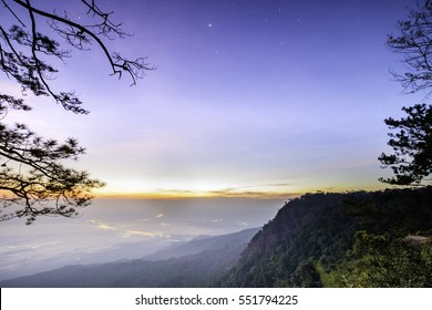 Night to Sun rise at Nok An cliff. Point of interested of Phu Kradueng national park. Loei, Thailand. before sunrise

starry night before sunrise