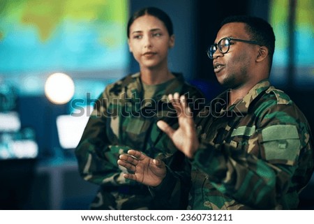 Night, talking and people in army with a strategy, cyber security or military communication. Data center, war and a black man speaking to a woman about government secret, surveillance or system