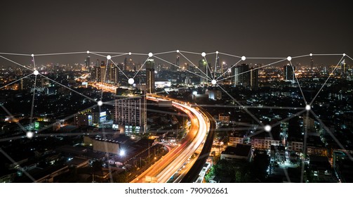 Night Time City Scape With Connecting Dots For Networking And Communication.