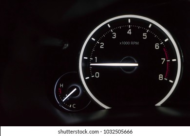 Night time close up of car engine speed gage - Shutterstock ID 1032505666