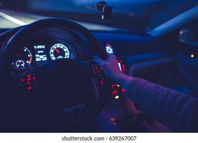 Night Time Driving. Car Cockpit View With Shallow Depth. Traveling At Night. 