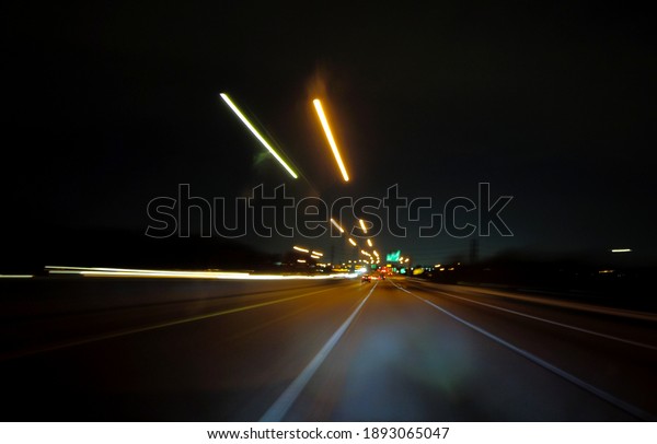 Night time at a\
freeway with high speed\
motion