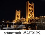 Night time photo of the Tower Bridge in Old Town Sacramento