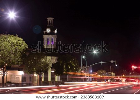 Night time traffic streams through historic downtown Red Bluff, California, USA.