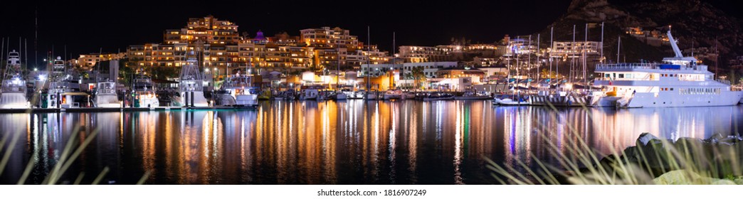 Night Time View Of The Cabo San Lucas Marina And Skyline.