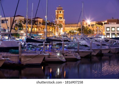 Night Time View Of The Cabo San Lucas Marina And Skyline.