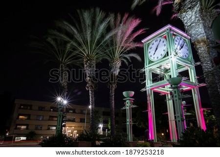 Night time view of the public clock tower in Garden Grove, California, USA.