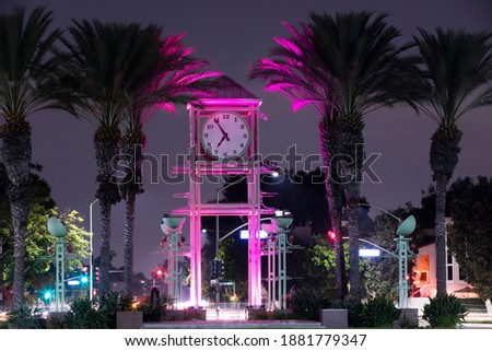 Night time view of the public clock tower in Garden Grove, California, USA.